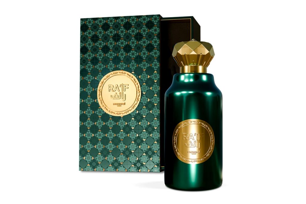 Frasco verde metálico de perfume oriental com tampa dourada e caixa decorada em padrões geométricos com selo dourado.